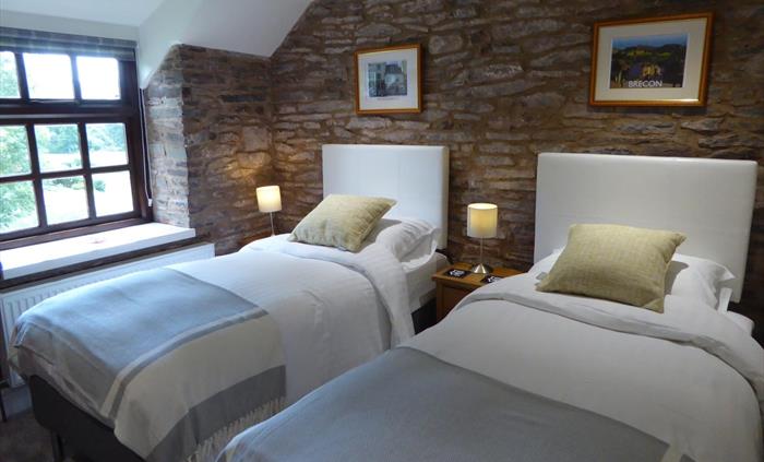 The Farmhouse at Hilltops Brecon Holiday Cottages has a King en-suite together with a Twin bedroom and separate shower room